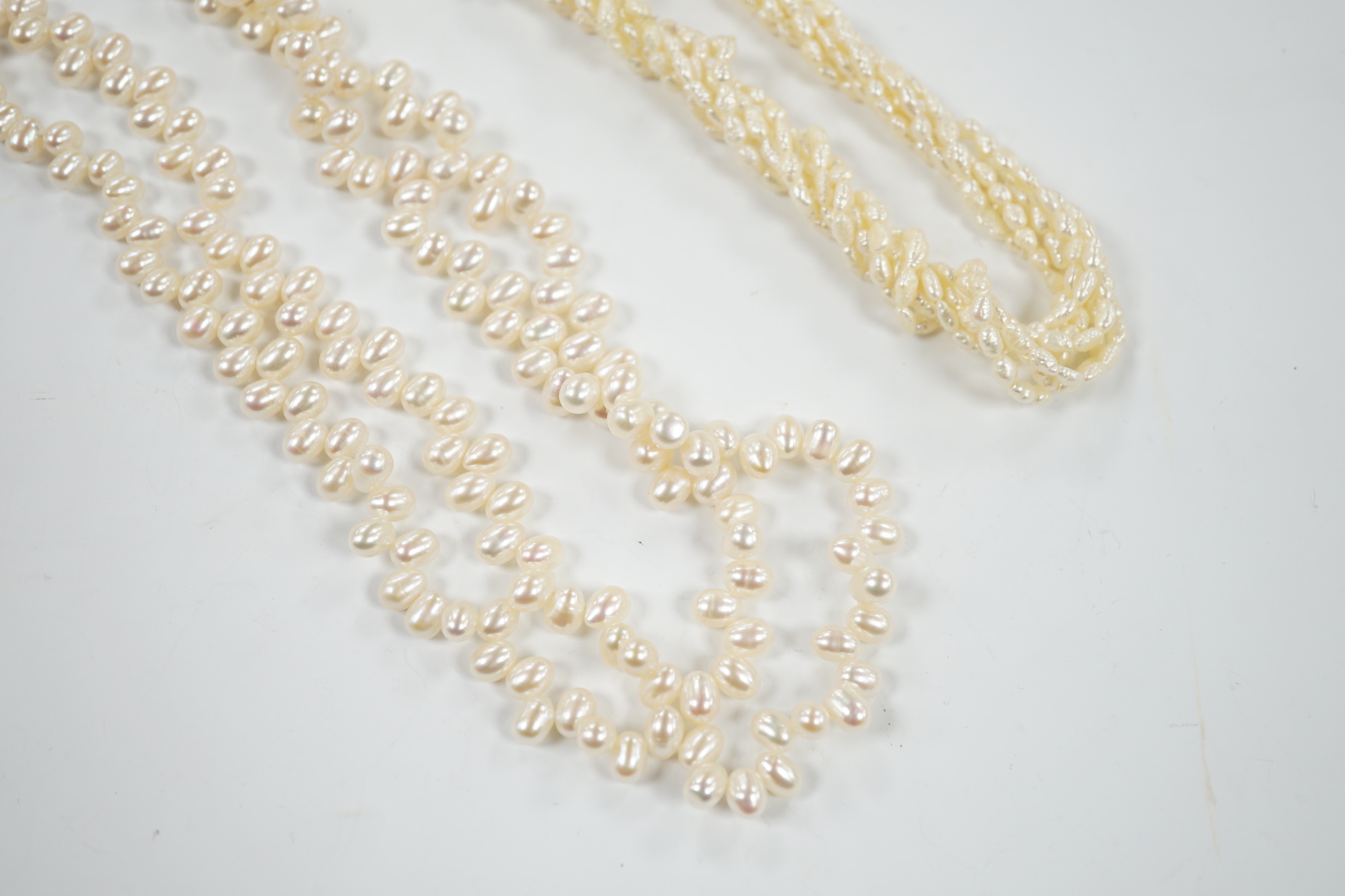 A double strand freshwater pearl necklace, with 585 yellow metal clasp, 50cm and one other freshwater pearl necklace with 585 yellow metal clasp.